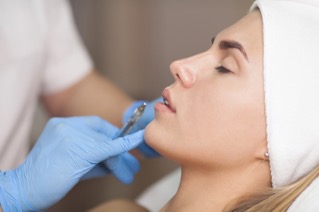 Woman receiving injectables