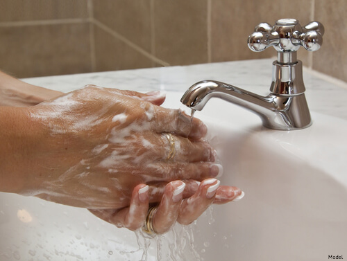 Person washing their hands thoroughly