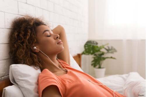 Woman laying on the couch