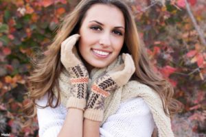 woman Wearing gloves and a scarf