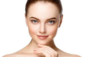 a portrait of a beautiful woman with smooth skin after laser skin rejuvenation treatments